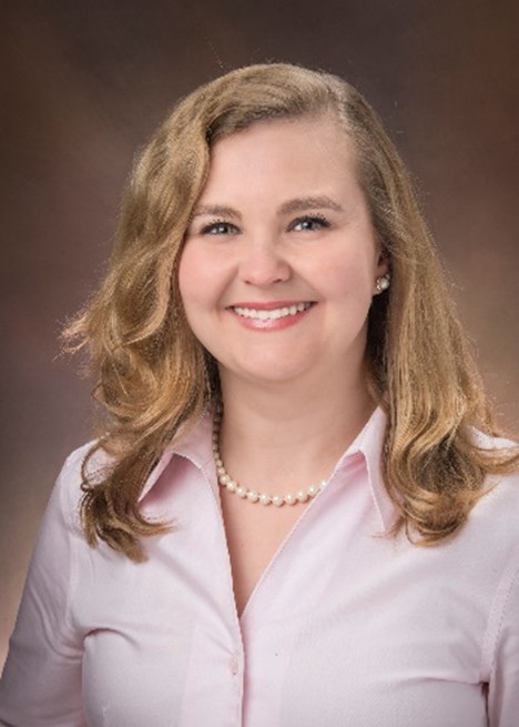 Portrait of Dr. Meghan Kraenbring Comerford, PsyD, Licensed Psychologist at Little Dove Psychology